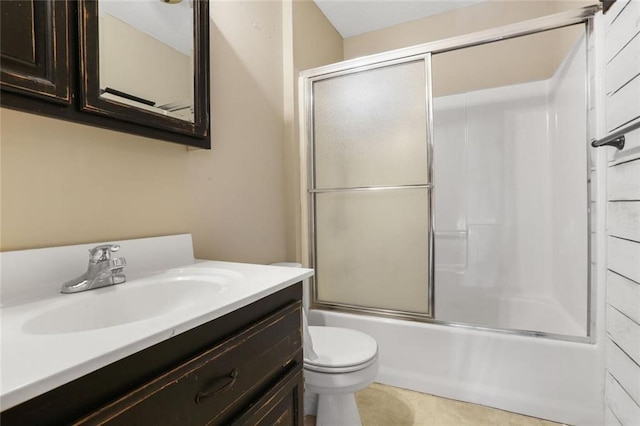 full bathroom with vanity, toilet, and enclosed tub / shower combo