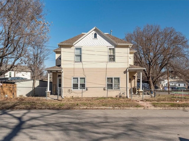 view of side of property with fence