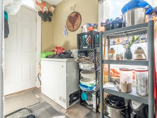 laundry room with plenty of natural light