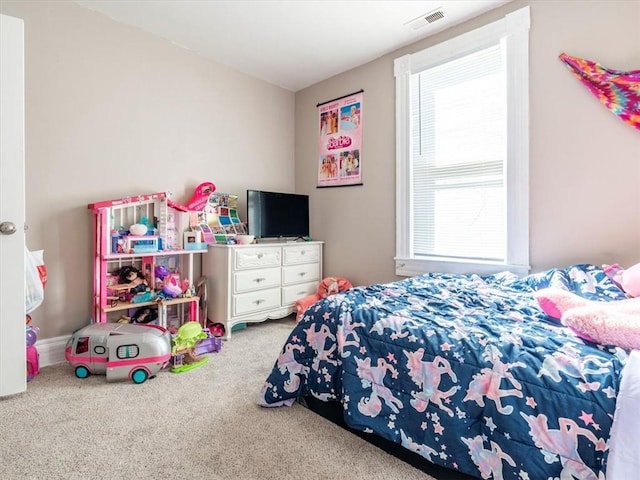 bedroom featuring visible vents and carpet