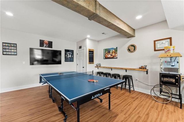 rec room featuring visible vents, baseboards, beam ceiling, recessed lighting, and wood finished floors