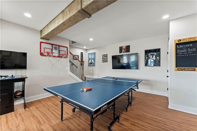 playroom with recessed lighting, baseboards, beam ceiling, and wood finished floors