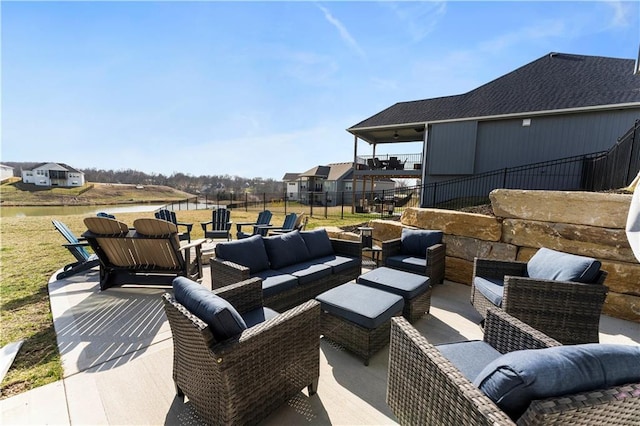 view of patio / terrace with an outdoor hangout area and fence