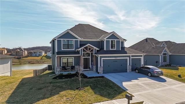 view of front of house with central air condition unit, driveway, stone siding, a front yard, and a garage