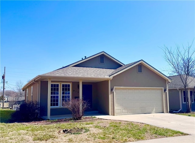 ranch-style house featuring roof with shingles, a garage, driveway, and stucco siding