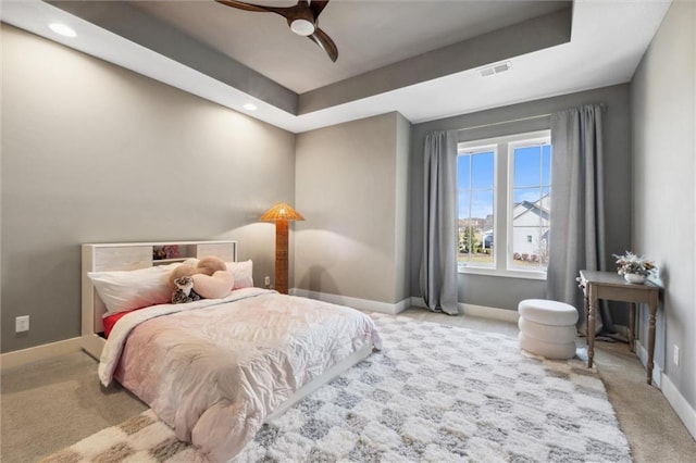 16121 Paradise St, Overland Park, KS 66221 - carpeted bedroom featuring a raised ceiling, recessed lighting, and a ceiling fan