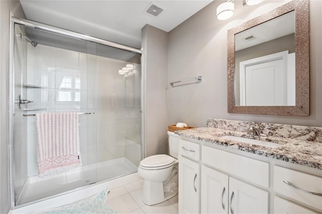 16121 Paradise St, Overland Park, KS 66221 - full bathroom with vanity, a shower stall, and tile patterned floors