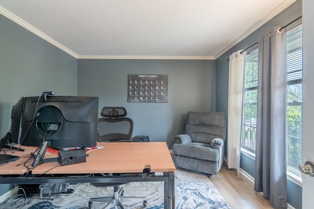 office area with baseboards, ornamental molding, and wood finished floors