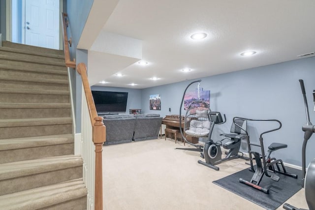 exercise area featuring carpet, recessed lighting, and visible vents