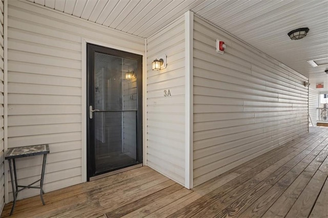 5501 NE 80th Ter Unit 3A, Kansas City, MO 64119 - property entrance with a wooden deck