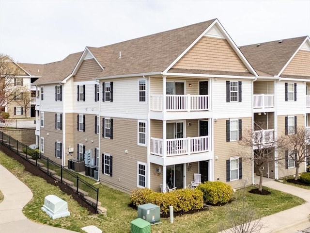 5501 NE 80th Ter Unit 3A, Kansas City, MO 64119 - view of property with central air condition unit and fence
