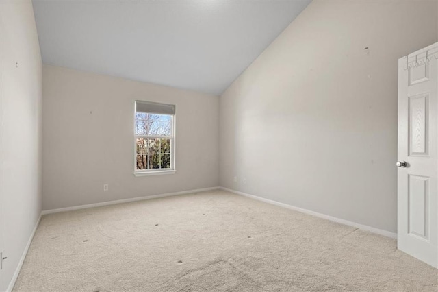 5501 NE 80th Ter Unit 3A, Kansas City, MO 64119 - carpeted spare room featuring baseboards and lofted ceiling