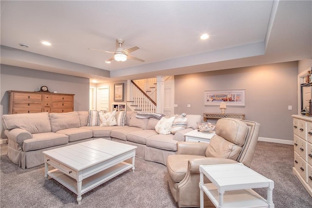 carpeted living room with recessed lighting, a ceiling fan, stairs, and baseboards