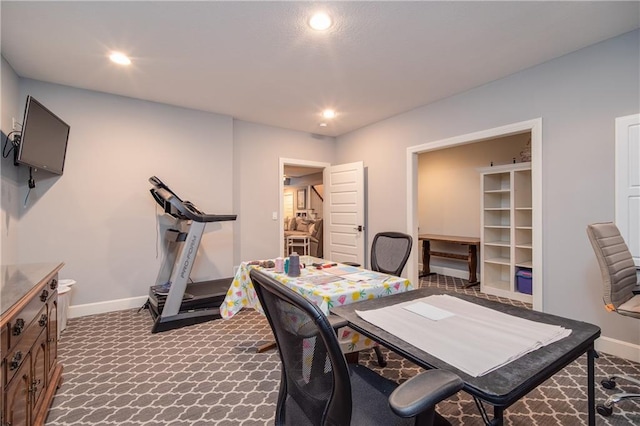 office with recessed lighting, baseboards, and dark colored carpet