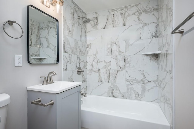 bathroom featuring vanity, toilet, and shower / bath combination