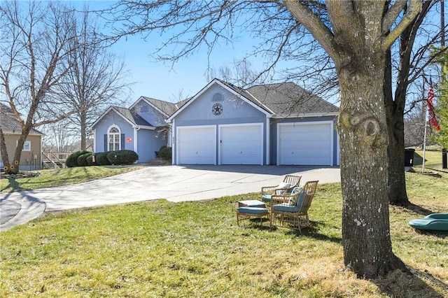 ranch-style home with stucco siding, an attached garage, concrete driveway, and a front lawn