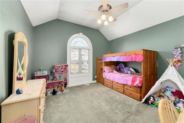 bedroom with lofted ceiling, carpet flooring, and a ceiling fan