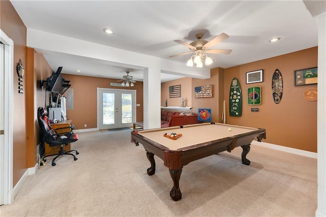 rec room featuring pool table, baseboards, light colored carpet, french doors, and a ceiling fan