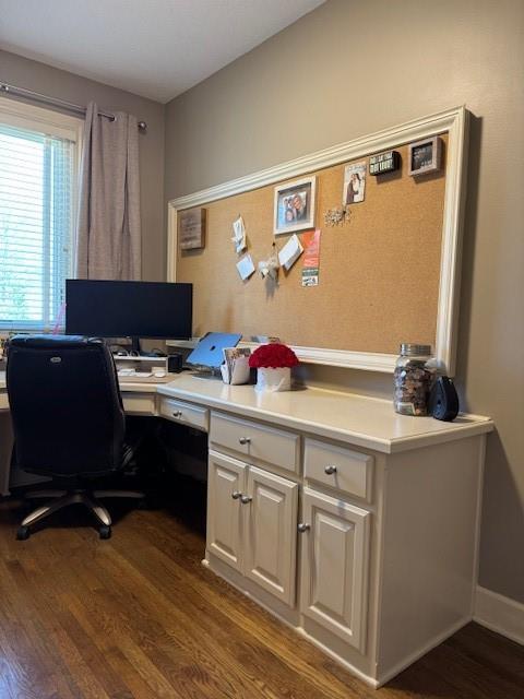 office area featuring baseboards and dark wood-style floors