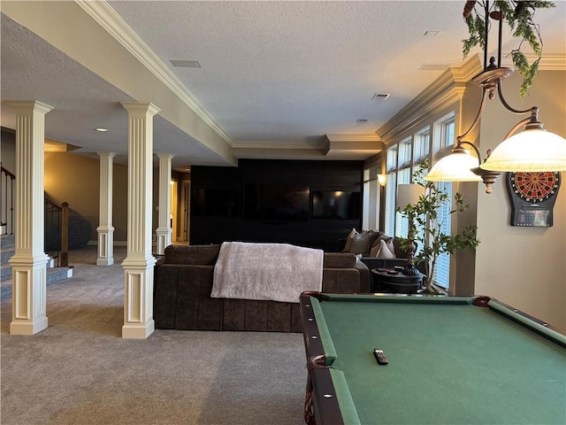 playroom featuring visible vents, ornamental molding, a textured ceiling, carpet flooring, and ornate columns