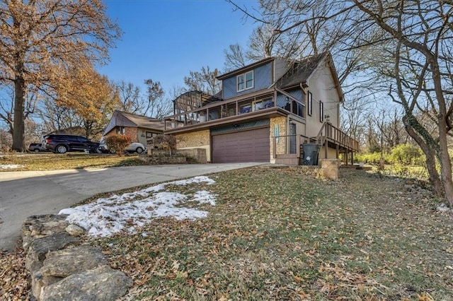 view of front of home featuring driveway and an attached garage