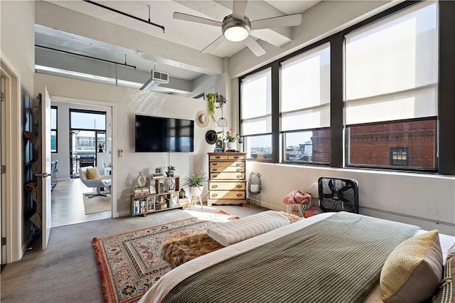 carpeted bedroom featuring visible vents