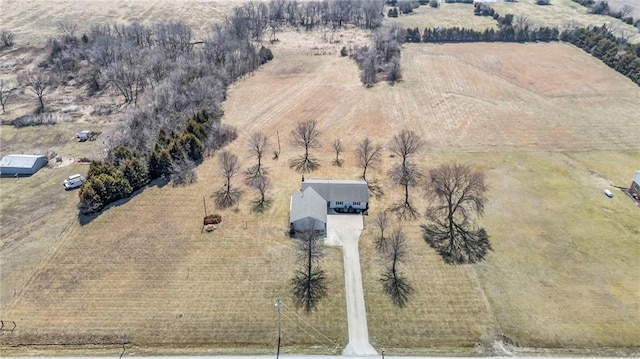 birds eye view of property featuring a rural view