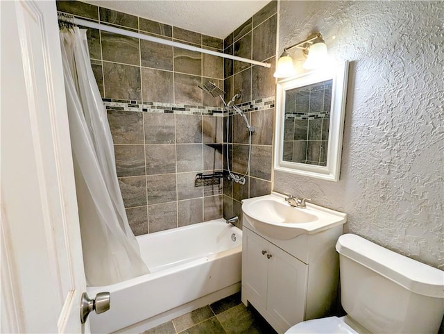 full bath with shower / bathtub combination with curtain, toilet, vanity, and a textured wall