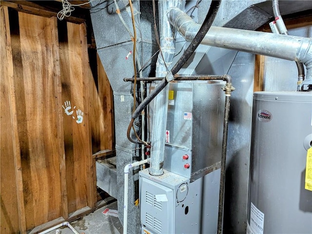 utility room with gas water heater