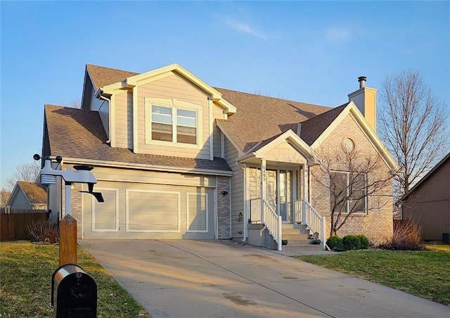 traditional-style house featuring concrete driveway, a shingled roof, a garage, brick siding, and a chimney