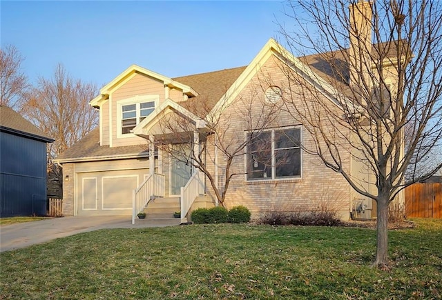 view of front of home featuring a front lawn, fence, concrete driveway, a garage, and brick siding