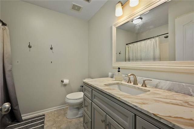 full bathroom featuring visible vents, toilet, tile patterned flooring, baseboards, and vanity