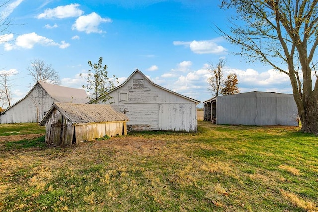 exterior space with an outbuilding and a barn