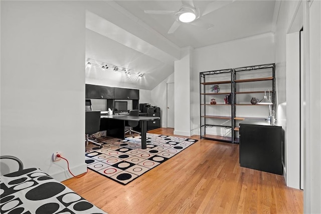 office with baseboards, ceiling fan, and wood finished floors