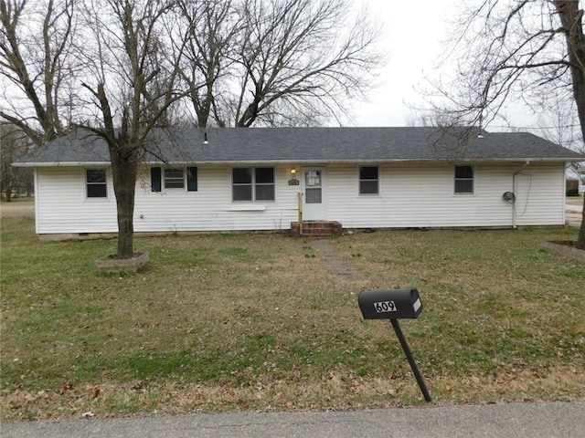 ranch-style house with a front lawn and entry steps