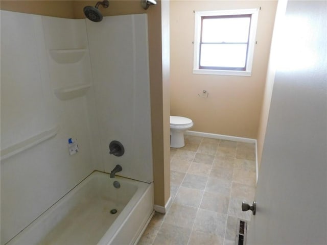 full bathroom featuring shower / washtub combination, toilet, and baseboards