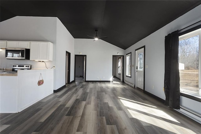 interior space featuring high vaulted ceiling, a ceiling fan, a baseboard heating unit, dark wood finished floors, and baseboards