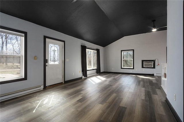 interior space featuring an AC wall unit, a baseboard heating unit, baseboards, dark wood-style flooring, and vaulted ceiling