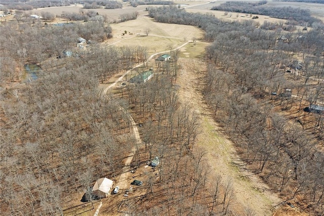 birds eye view of property with a rural view