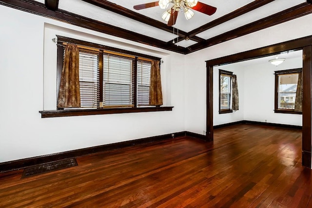 unfurnished room featuring visible vents, baseboards, coffered ceiling, a ceiling fan, and dark wood-style flooring