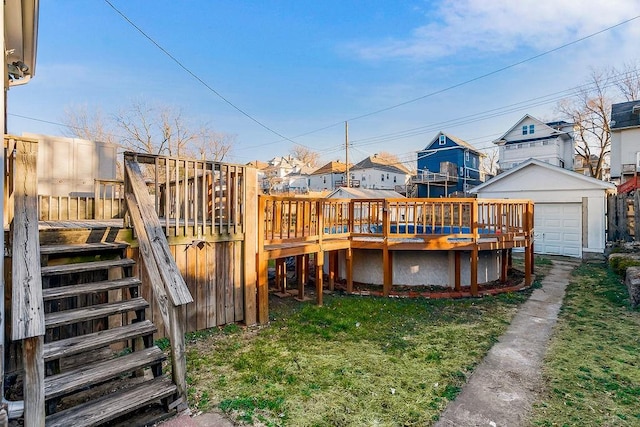 view of yard featuring a deck and an outdoor structure