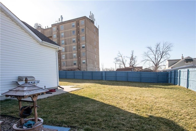 view of yard with a fenced backyard