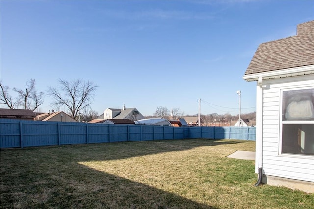 view of yard featuring a fenced backyard