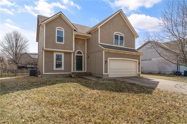 traditional-style home featuring a front lawn, fence, concrete driveway, central AC, and a garage