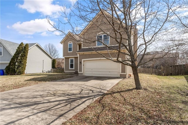 traditional-style house with stucco siding, a front lawn, driveway, fence, and a garage