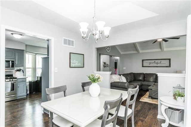 dining area featuring visible vents, dark wood-type flooring, a chandelier, and vaulted ceiling with beams