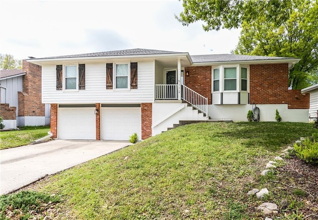 view of front of property featuring a garage, concrete driveway, a front yard, and brick siding