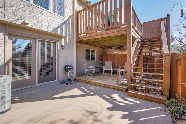 view of patio with stairway, central AC, and a wooden deck