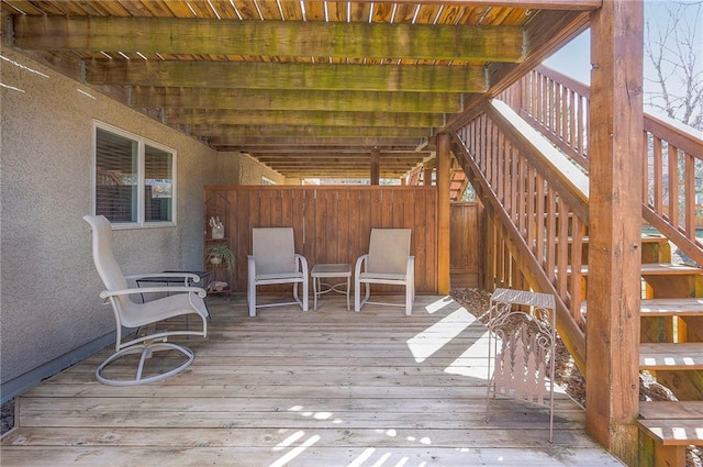 wooden deck featuring stairs