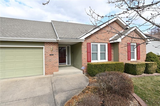 ranch-style house with an attached garage, brick siding, driveway, and a shingled roof